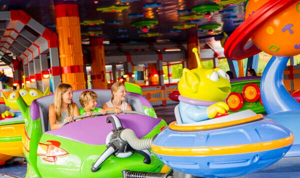 Alien Swirling Saucers in Toy Story Land Little green Aliens from Pixar Animation StudiosÕ Toy Story films pilot toy rocket ships in the Alien Swirling Saucers attraction in Toy Story Land at Disney's Hollywood Studios. The out-of-this-world attraction is inspired by Andy's toy playset from the Pizza Planet restaurant. With multi-colored lighting and sound effects from throughout the galaxies, Walt Disney World guests swirl and whirl in the toy rocket ships while the Aliens try to get captured by "The Claw" that hangs overhead. (Steven Diaz, photographer)